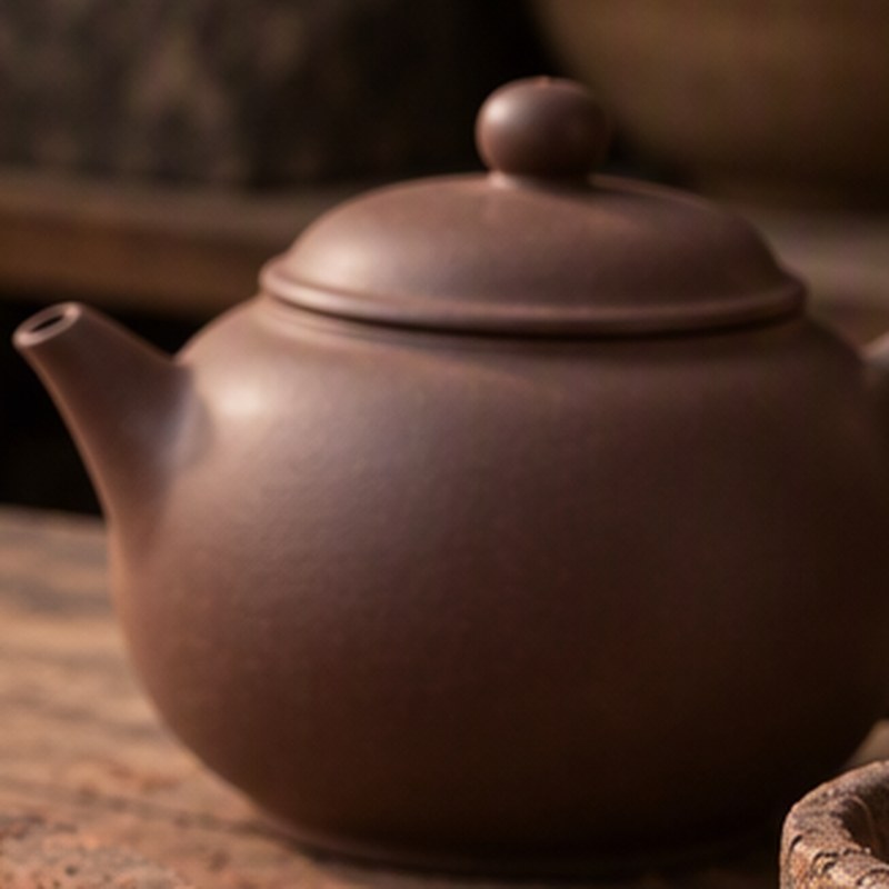 A finished Yixing purple clay teapot